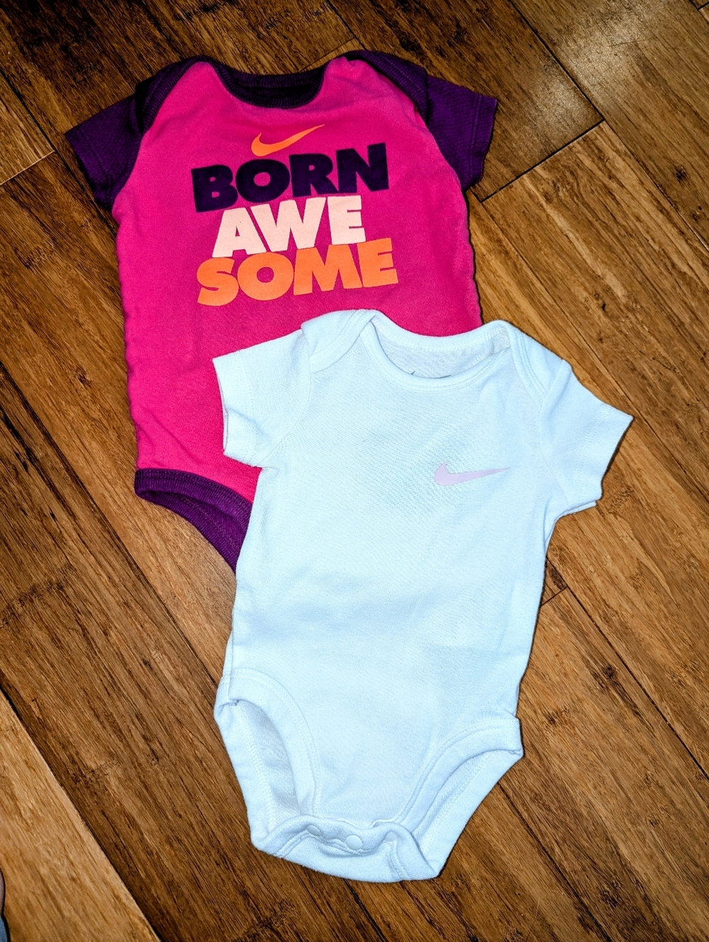 2 piece Nike Baby girls bodysuits.